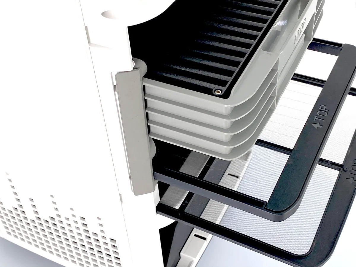 AirSoap X3 washable collection plates sliding out of the unit